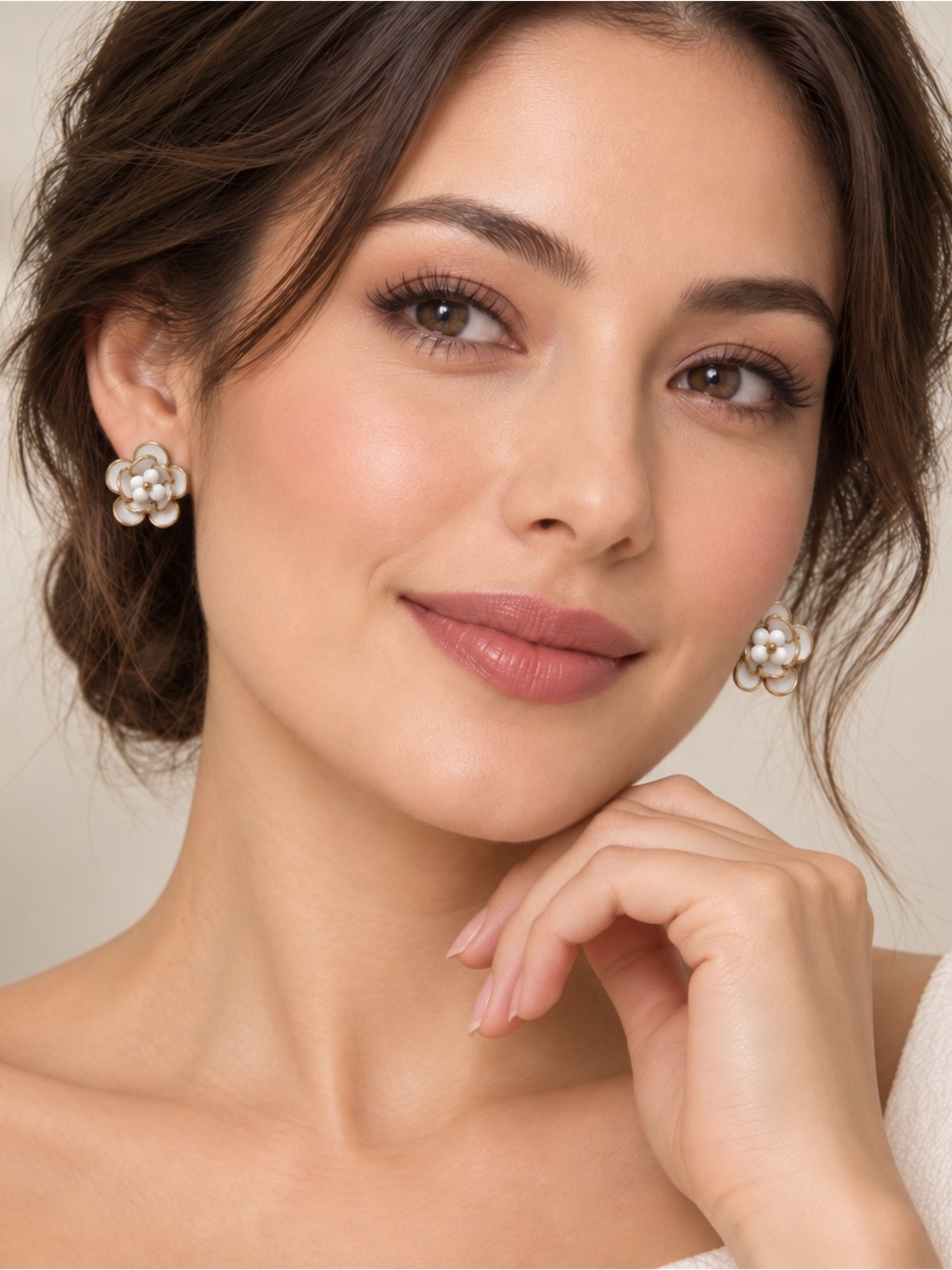 Vintage-style clip-on flower earrings with a soft, feminine look.